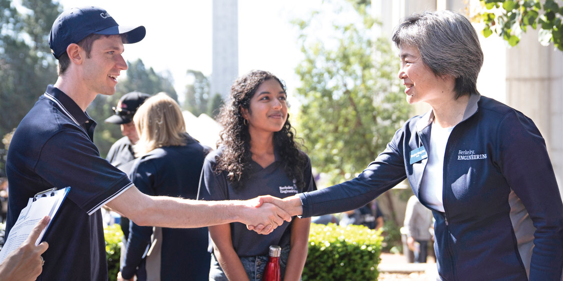 Dean Tsu-Jae King Liu greets students at a Berkeley Engineering community event.