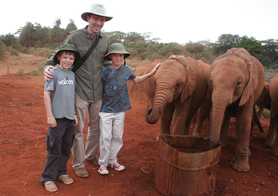 Jean-Paul Tennant with kids and baby elephants
