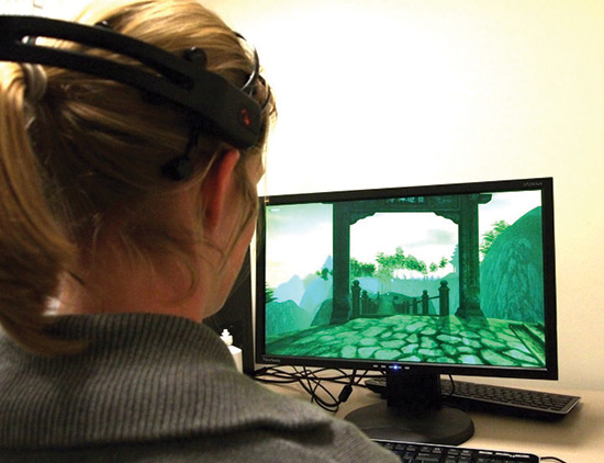 Participant testing a brainwave-reading headset
