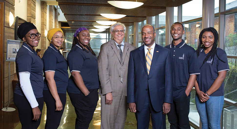 Deans Shankar Sastry and Gary May with students