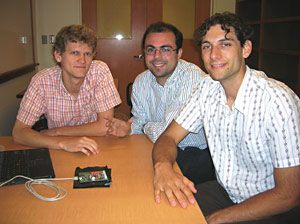 SeroScreen creators with their device on a table