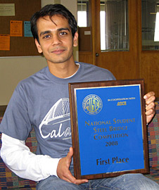 Civil and environmental engineering student Raman Bhatia, captain of Calatrava team, holds Cal's First Place plaque. Photo credit: Abby Cohn 