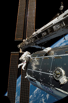 Spacewalk along the edge of the Columbus module. Photo courtesy of NASA 