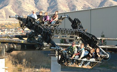 Tim Jacobi (second from front in bottom row) is part of the brave group testing a prototype of his Eagle amusement park ride, inspired by a childhood toy. The master's candidate in mechanical engineering, who put his studies on hold in 2004 for a job in the roller-coaster business, now hopes to graduate in December 2008. Photo credit: Sandra Jacobi 