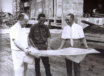 CONSULTANT: In 1980, Harvey Ludwig, left, advises senior engineers in Indonesia on how to modify the operation and maintenance planning of a water supply treatment plant being built in Jakarta, the capital. COURTESY HARVEY LUDWIG
