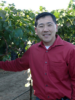 THE VINTNER: Jason Mikami (B.A.’92 East Asian Languages, B.S.’98 EECS) is producing handcrafted, award-winning Zinfandel wines from his family’s Central Valley vineyard. He was inspired by his family’s century-old tradition of grape growing in the Lodi region. COURTESY JASON MIKAMI