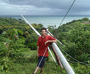 ME graduate student David Olmos repairing a wind turbine in Monkey Point, Nicaragua, as part of a summer internship with the Cal Energy Corps. GUILLAUME CRAIG PHOTO