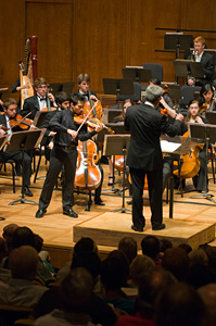 INSTRUMENTAL: Mechanical engineering student Ernest Ting-Ta Yen, standing with violin, performs in his spare time with UC Berkeley’s University Symphony Orchestra. Last fall, Yen starred as a soloist, playing Erich Korngold’s violin concerto during the orchestra’s opening concerts in Hertz Hall. COURTESY DEPARTMENT OF MUSIC