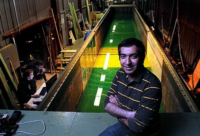 Mechanical engineer Reza Alam is testing theories about “cloaking” ocean waves in the wave tank at the Richmond Field Station. (Photo by Thomas Walden Levy)