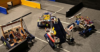 Robots competing in the annual competition held by Pioneers in Engineering. (Photo courtesy PiE)