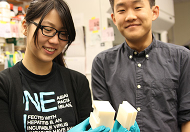 Students with 3D-printed cell-sorting device