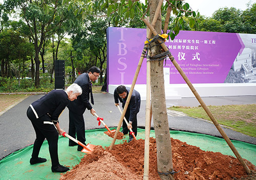 Chancellor Carol Christ, Tsinghua University President Qiu Yong and Shenzhen mayor Rugui Chen plant a banyan tree