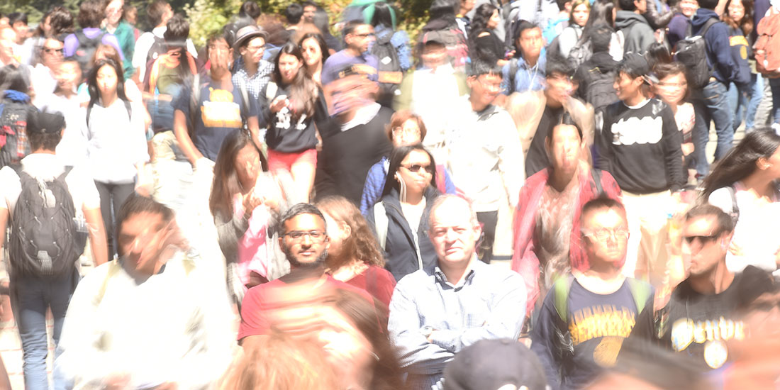 Barath Raghavan and Yahel Ben-David in a crowd of moving students