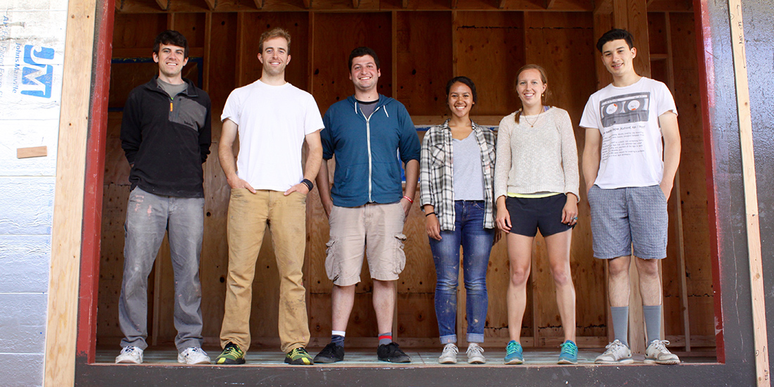 THIMBY team members in the tiny house they constructed for a statewide competition.