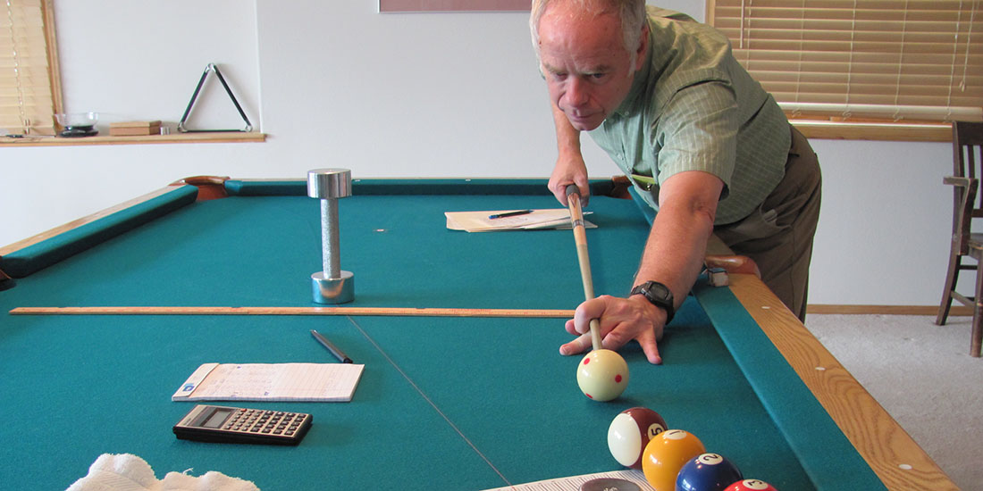 Bob Jewett studying the physics of pool 