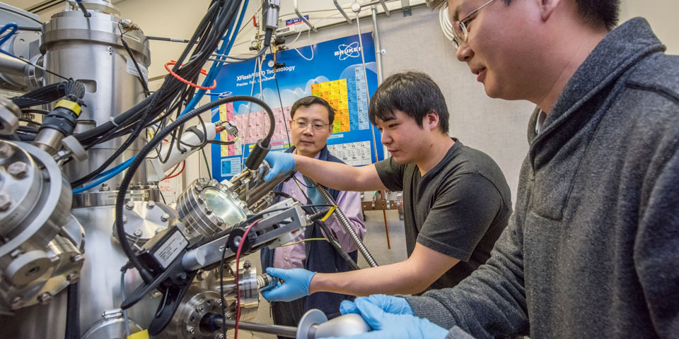 Berkeley Lab scientists use a nano-Auger electron spectroscopy instrument to measure the content of materials.