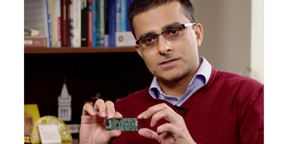 Ali Javey holding a sensor chip
