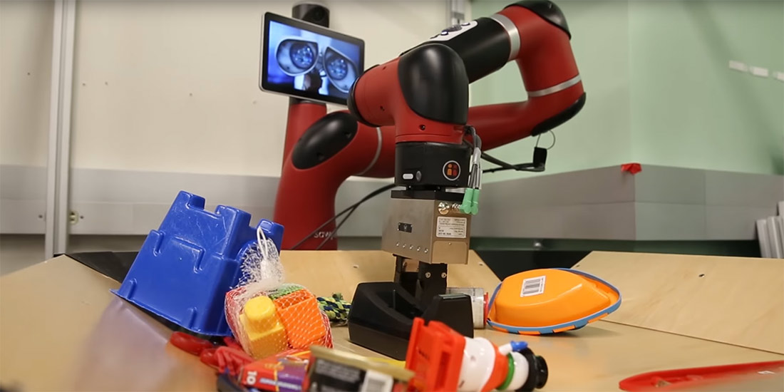 The robot Vestri plays with objects to learn how to complete a task.