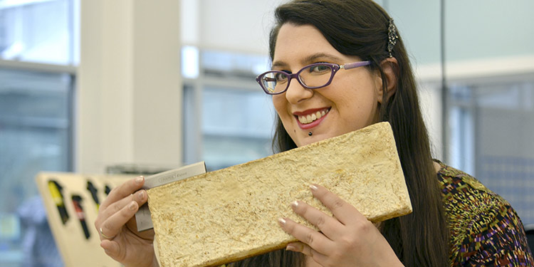 Ph.D. candidate Sonia Travaglini measures a mushroom brick