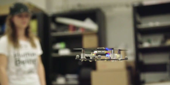 Small drone flying in a lab