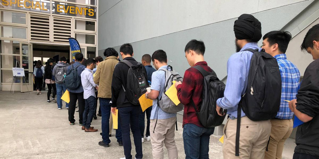 Computer science students waiting to enter a job fair at UC Berkeley
