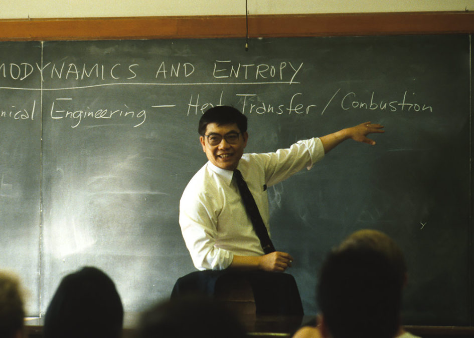 Chang-Lin Tien at a blackboard