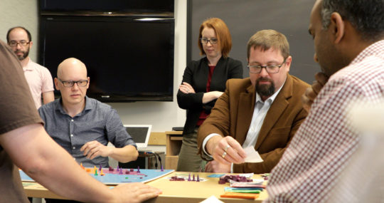Players during a boardbgame demo of SIGNAL