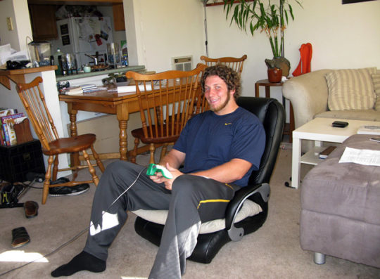 Fisher unwinds at home by playing video games in his favorite chair