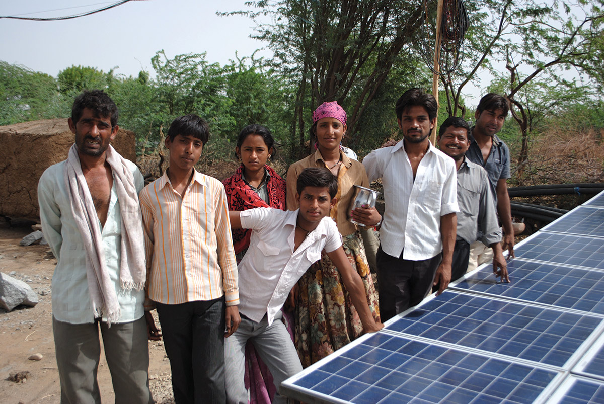 Villagers by solar power grid