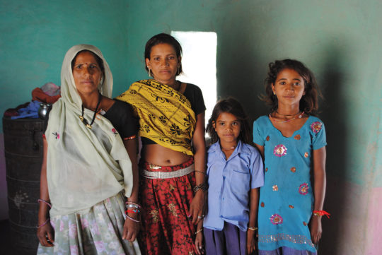 Four women and girls from different generations