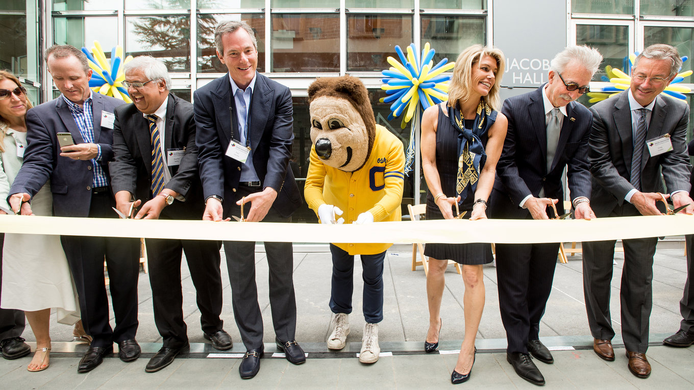 Oski and friends cut the ribbon opening Jacobs Hall