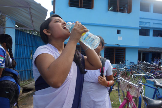 Students and school staff drink arsenic-free, filtered water