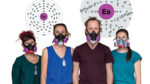 Berkeley Lab scientists Leticia Arnedo-Sanchez (from left), Katherine Shield, Korey Carter, and Jennifer Wacker wearing protective masks, in front of graphics of the atomic structure of cerium and einsteinium