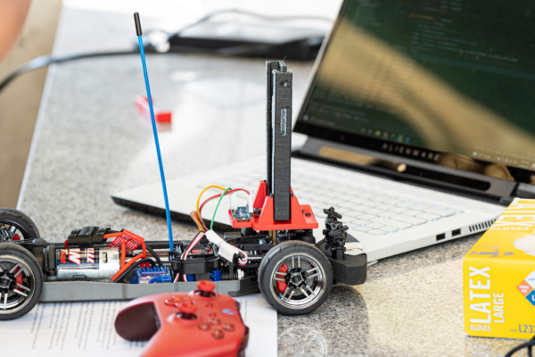 ROAR Academy race car and laptop