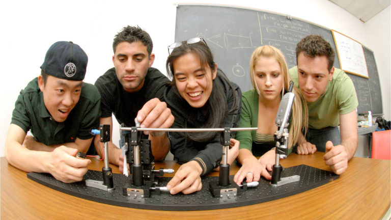 Fisheye view of students at a lab bench