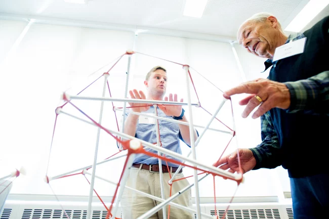 Fung Fellowship mentors with tensegrity model