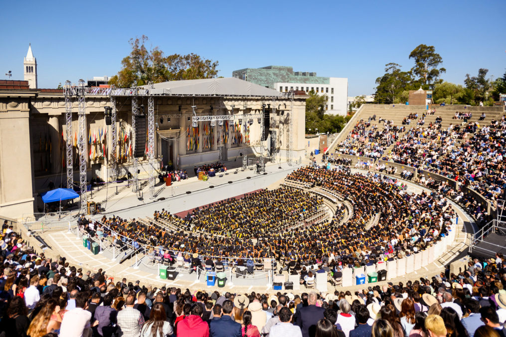The Campanile looms behind the Greek Theatre during commencement