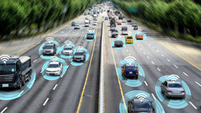 Rendering of autonomous self-driving vehicles on metro city road.