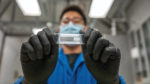 Ph.D. student researcher Junpyo (Patrick) Kwon demonstrates a biodegradable printed circuit