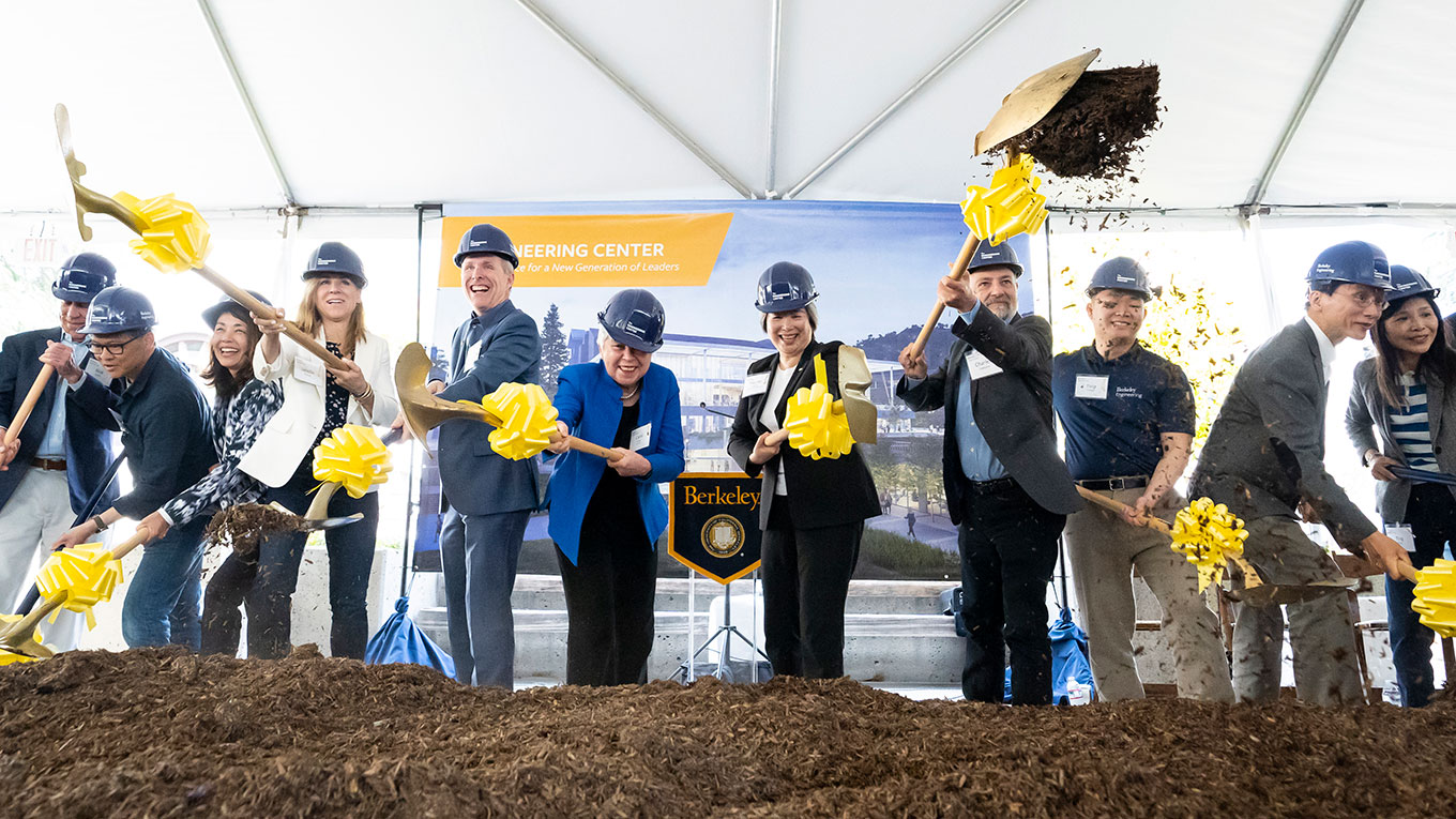 Photo of Chancellor Carol Christ (sixth from left) and College of Engineering dean Tsu-Jae King Liu (to the right of Christ) at a groundbreaking ceremony for the new Engineering Center.