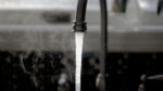 Photo of water from a faucet.