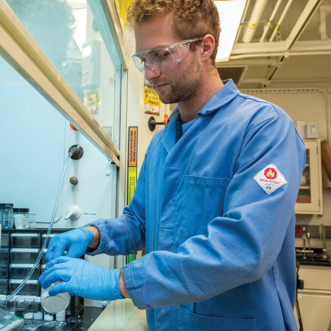 Drew Lilley of Berkeley Lab's Energy Storage & Distributed Resources Division works on a thermal storage sample of phase change material for low temperature applications.