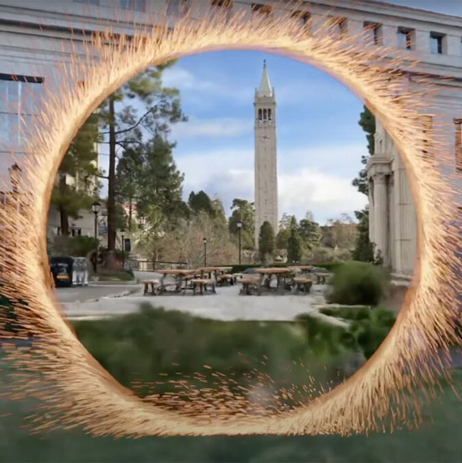 A flaming portal opens to a view of the Campanile.