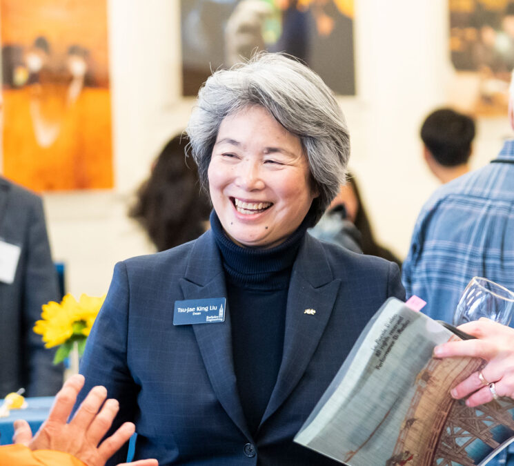 Tsu-Jae King Liu, dean of engineering, speaks with guests at a college event. (Photo by Adam Lau/Berkeley Engineering)
