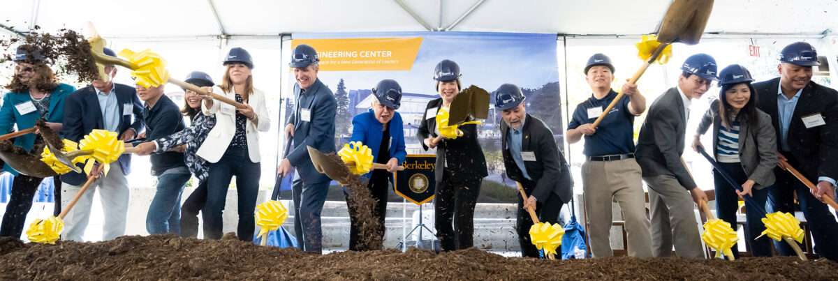 College leaders and students shoveling at the Engineering Center groundbreaking ceremony