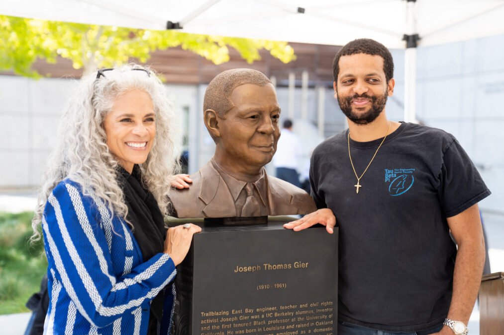 Sculptor Dana King and EECS professor Jelani Nelson, from left, with the new Joseph Thomas Gier statue.