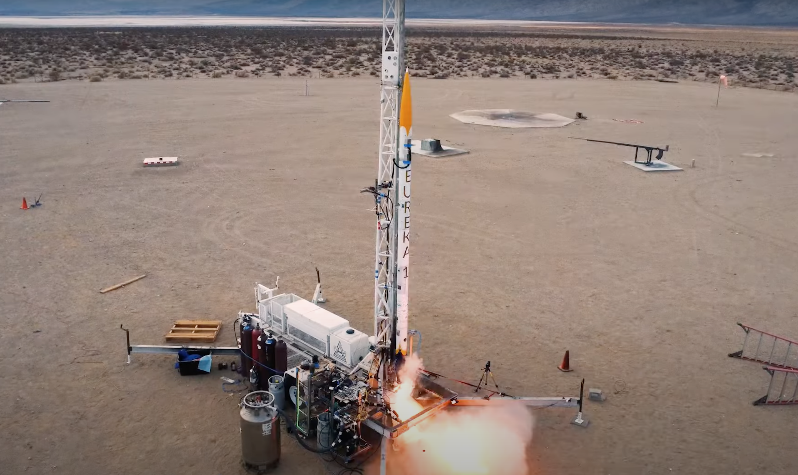 The liquid-fuel rocket, Eureka-1, on a launch pad.