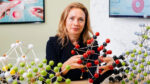 Kristin Persson, Daniel M. Tellep Distinguished Professor in Materials Science and Engineering at UC Berkeley, holding a molecular model.