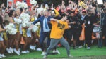 Kirk Herbstreit and Daniel Villasenor during the Field Goal Kicking Challenge segment on the set of College GameDay Built by the Home Depot at the University of California (Cal), UC Berkeley. (Photo by Phil Ellsworth / ESPN Images)