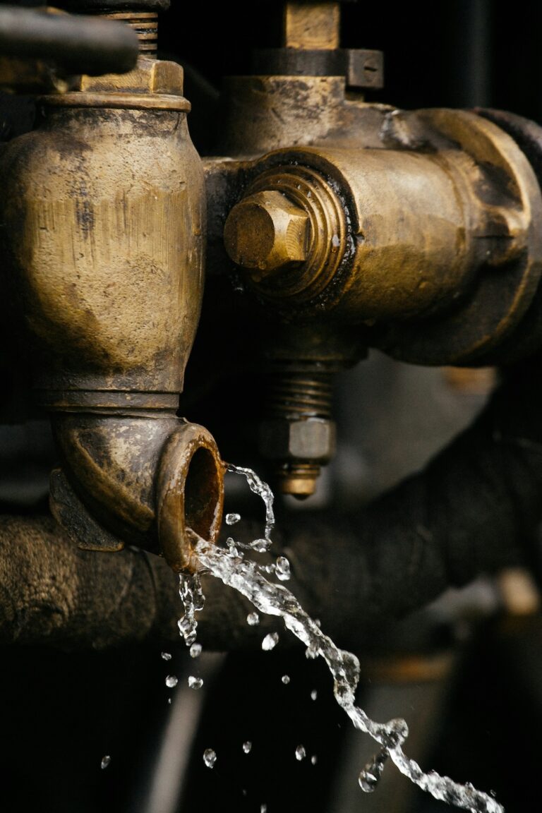closeup of a stream of water running out of a machine